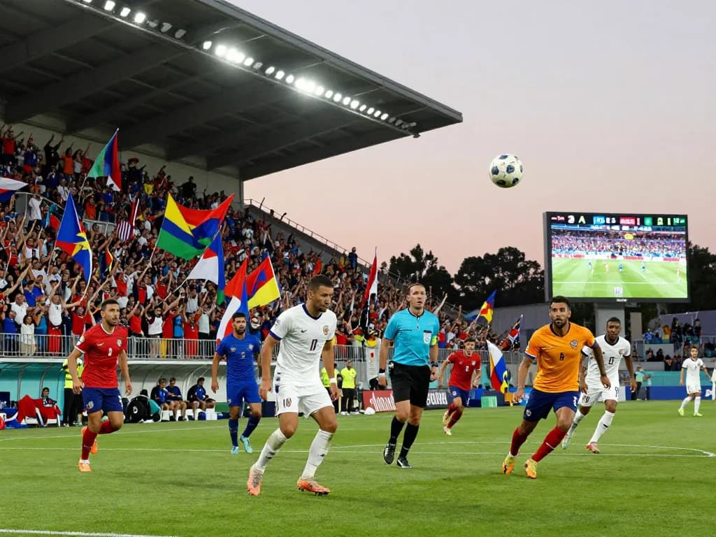 Soccer match at 7m showcasing competitive players and enthusiastic fans.